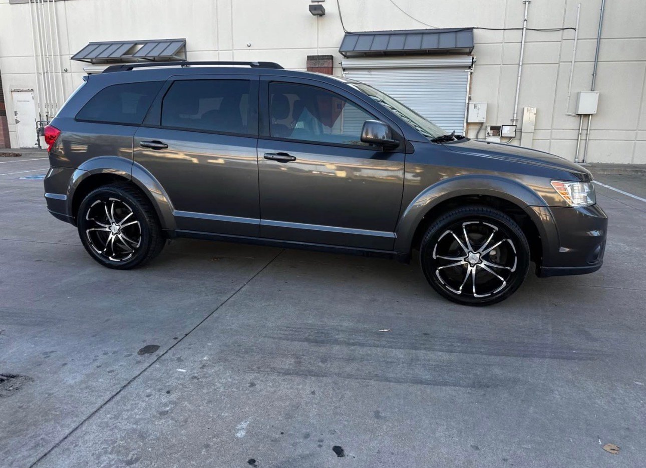 2015 Dodge Journey SXT Sport Utility 4D. 3-Row SUV